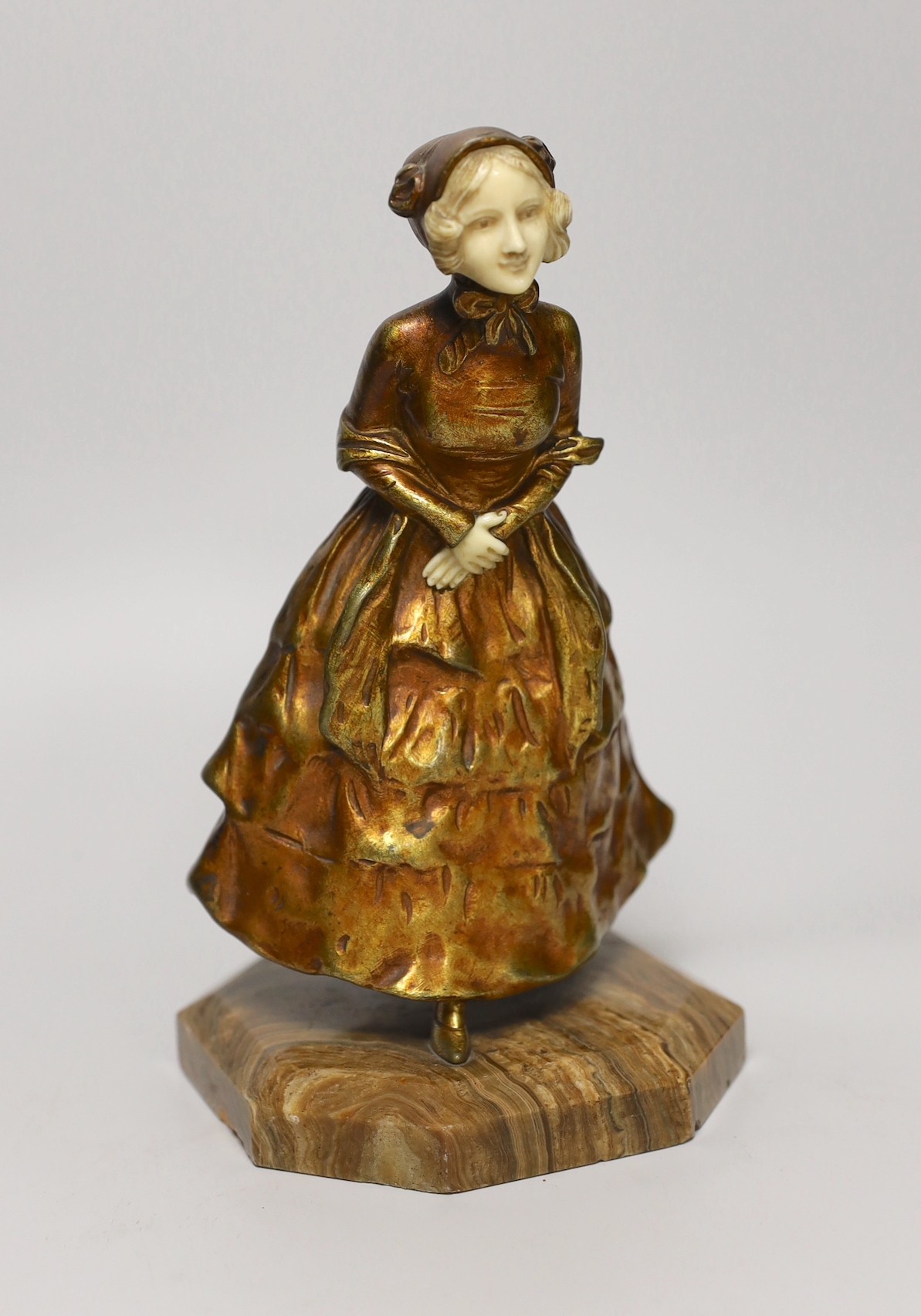 George van der Straeten (1856-1941), a bronze and ivory figure of a lady, on an onyx plinth, 22.5cm high